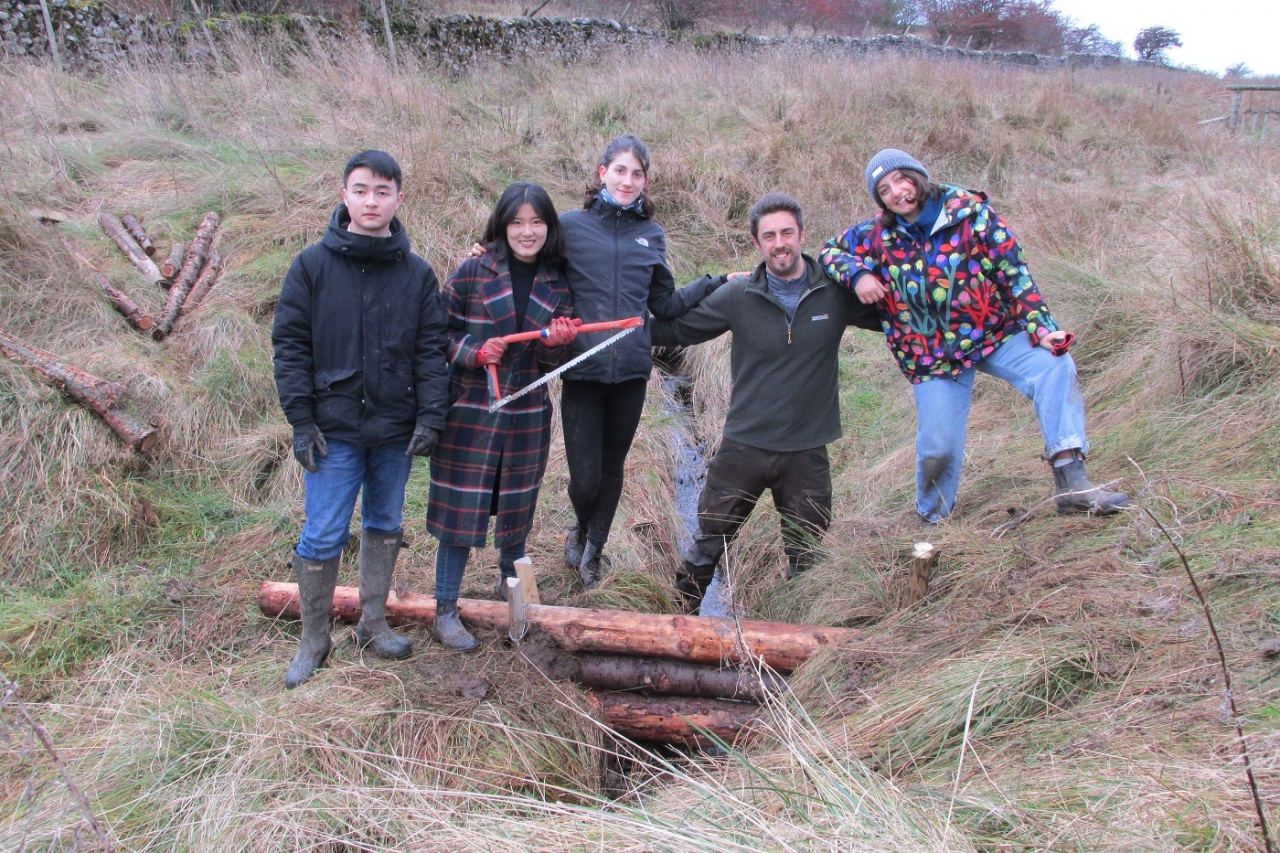 Students and staff from the University of Leeds building leaky dams as part of the Leeds Flood Alleviation Scheme