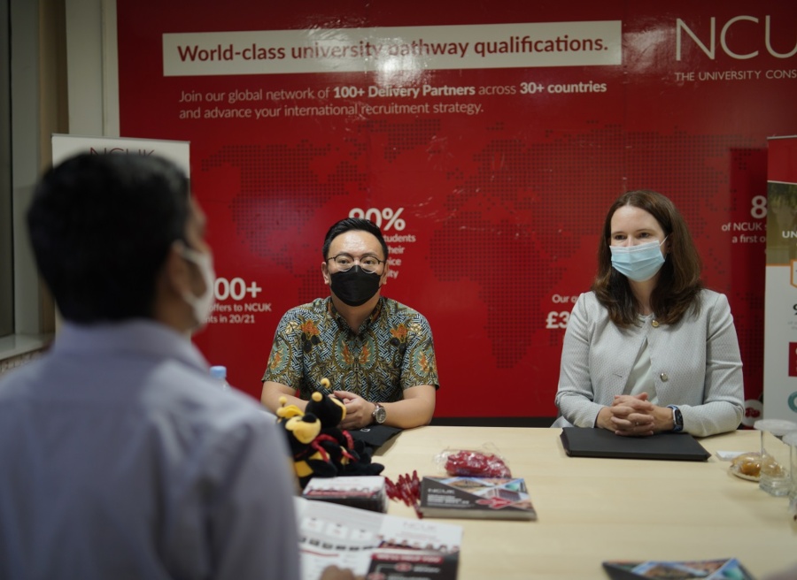 Staff interacting with each other