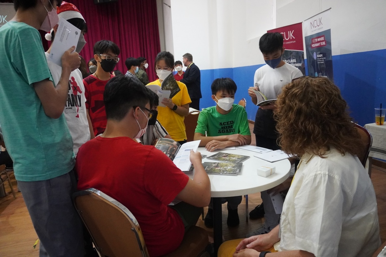 Students speaking with staff at Tenby Schools Setia Eco Park