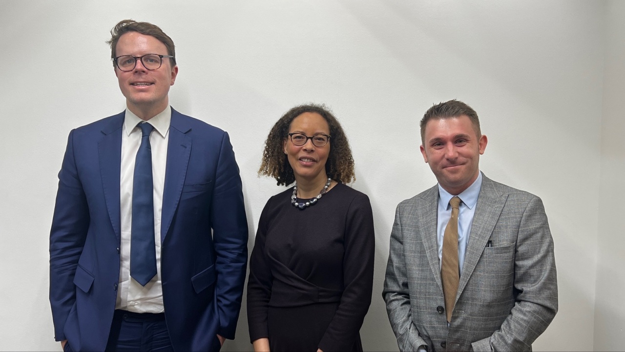 Stuart Smith and Brad Johnson with Tracy Knight, UK Representative and Head of Office for the Turks and Caicos Islands Government