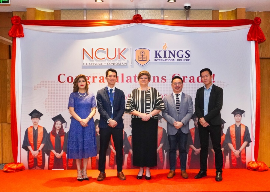 Staff at graduation ceremony