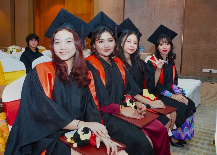 Students at their graduation ceremony