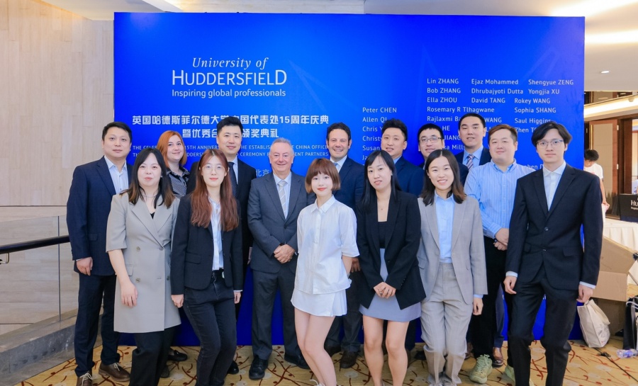 Guests posing for a photograph at the conference