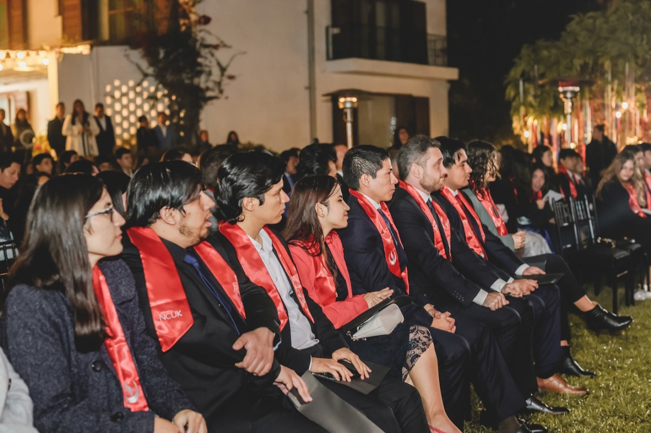 Students at graduation ceremony.