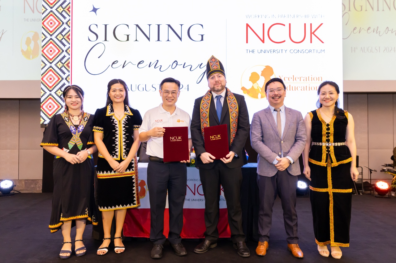 Staff members at the signing ceremony