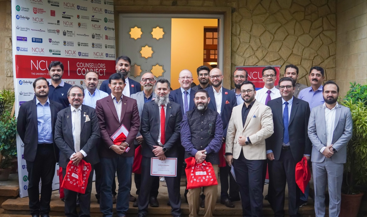 Delegation posing for picture