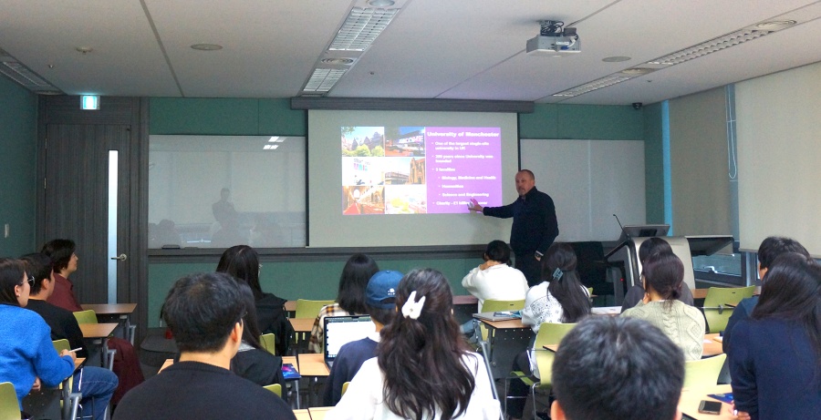 University representative speaking to students